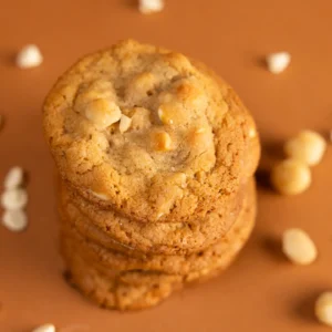 Freshly baked White Chocolate Macadamia Nut cookies with golden edges